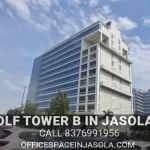 Side view of DLF Tower B Jasola District Centre, a premium commercial building in South Delhi.