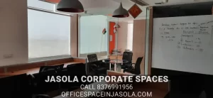 Exterior view of the commercial building offering premium office space for rent in DLF Tower B Jasola.