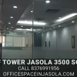 Clean and modern pantry area in a 3500 sqft office space for rent in DLF Tower Jasola for employee breaks.